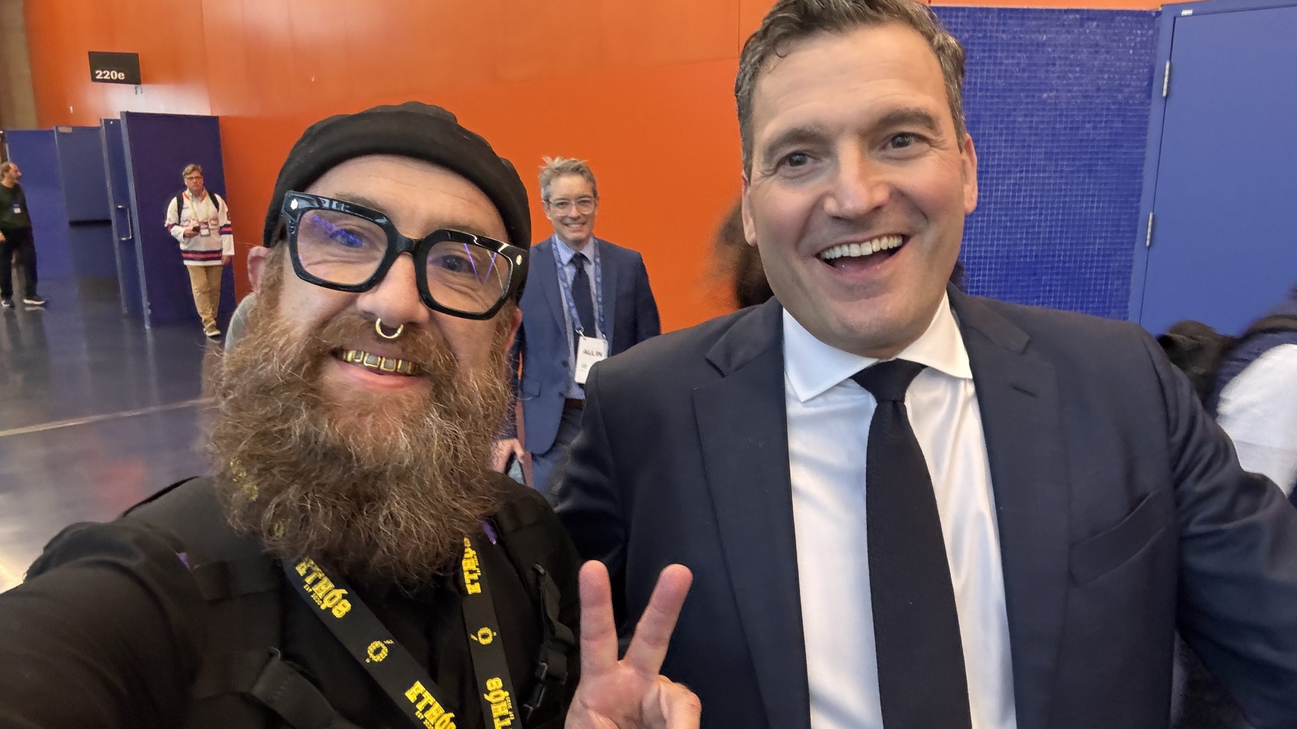 Kris Krüg takes a hallway selfie with Canada's AI minister Evan Solomon at ALL IN Montréal.